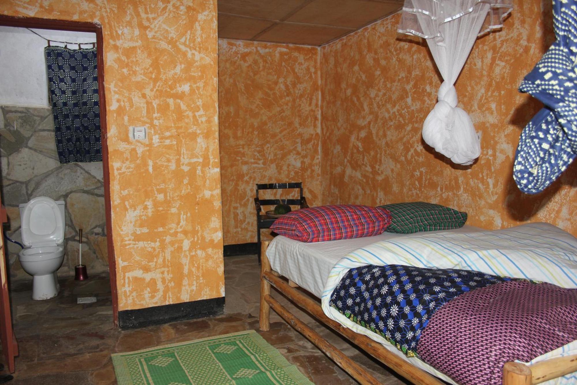 Red Rocks Rwanda - Campsite & Guesthouse Nyakinama Екстер'єр фото